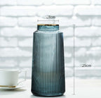 Light Luxury Retro Vertical Stripe Glass Vase With Gold Flower Arrangement