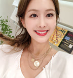 Gold coin portrait multi-layered necklace