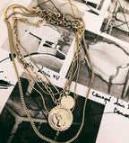 Gold coin portrait multi-layered necklace
